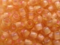 Preview: 11/0 10g TOHO Rocailles Light Topaz Peach Lined
