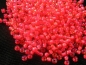 Preview: 11/0 10g TOHO Rocailles Light Topaz Neon Pink