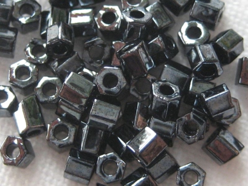 11/0 10g TOHO Hexagon Metallic Hematite