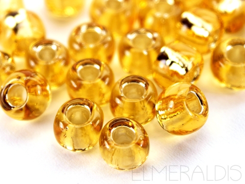3/0 TOHO Rocailles Silver Lined Light Topaz 10g