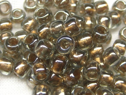 6/0 10g TOHO Rocailles Gold Lined Black Diamond