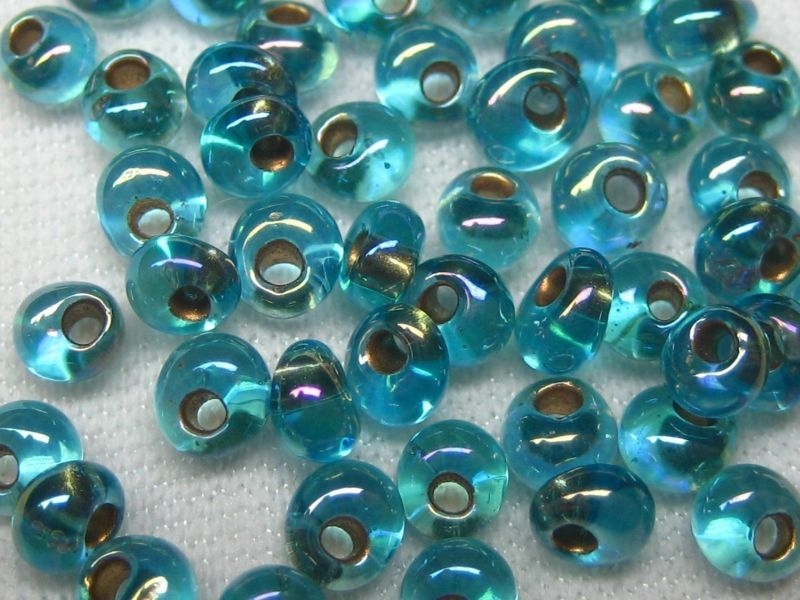3mm 10g TOHO Magatama Gold Lined Rainbow Aqua