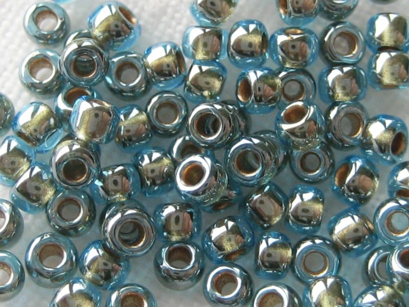 3/0 Rocailles TOHO Gold Lined Aqua 10g