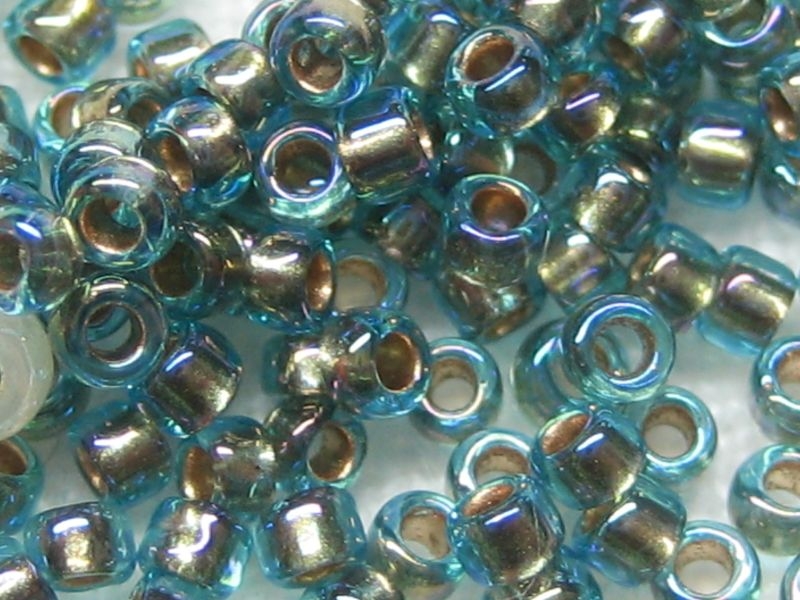 15/0 10g TOHO Rocailles Gold Lined Rainbow Aqua